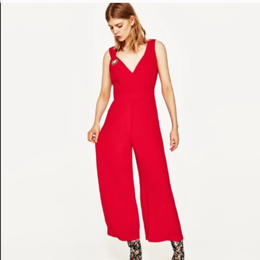 Red asymmetric shoulder strap eyelet jumpsuit